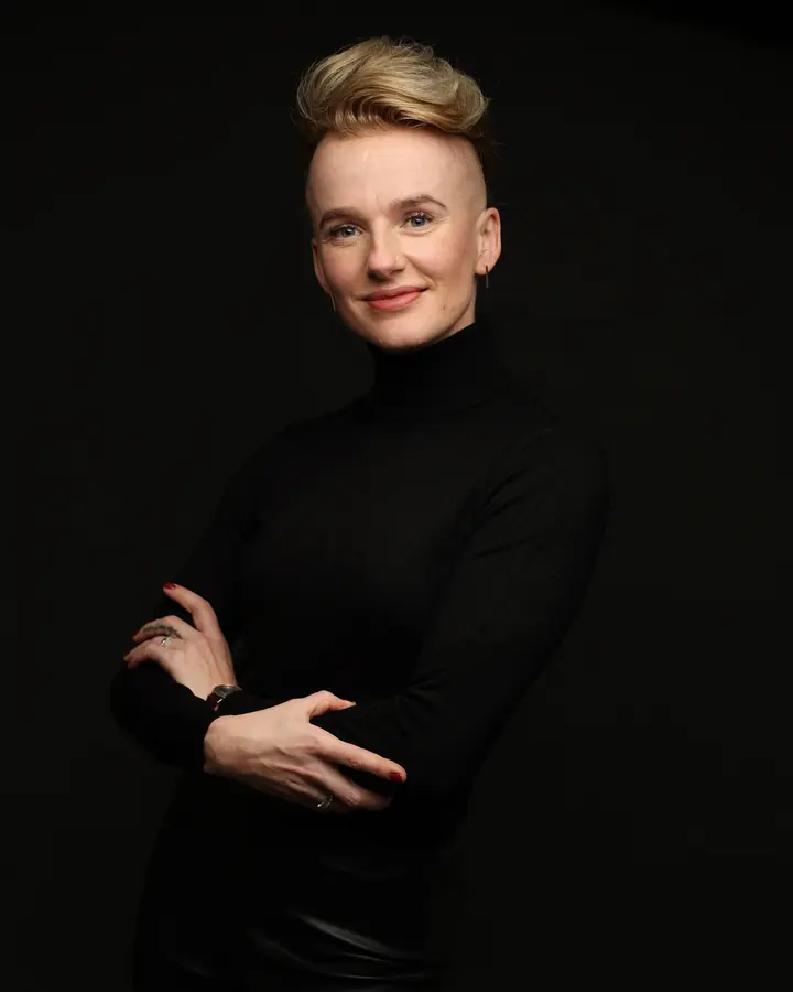 Magdalena Czajor with arms crossed, wearing a black turtleneck